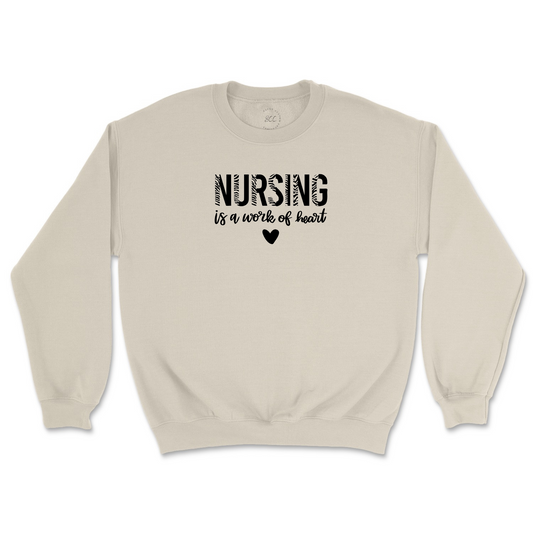 NURSING IS A WORK OF HEART - Unisex Sweatshirt